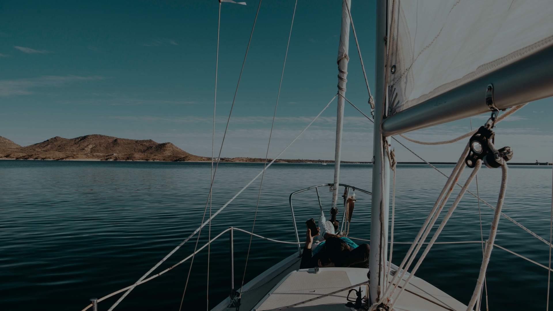 Looking out to sea from the deck of a sailing yacht