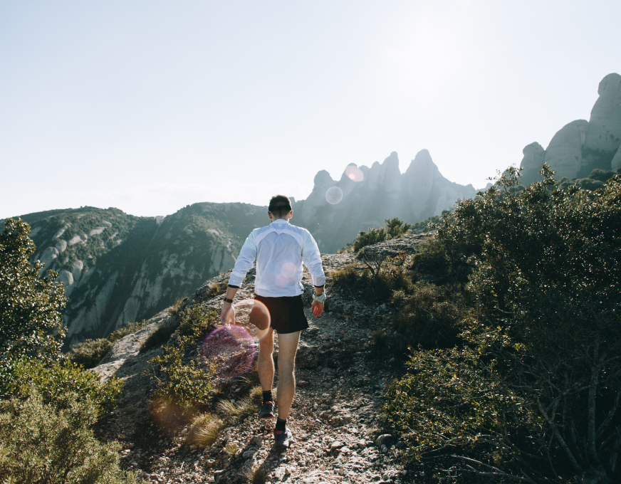 Two people hiking a coastal trail — Pelagus retreat