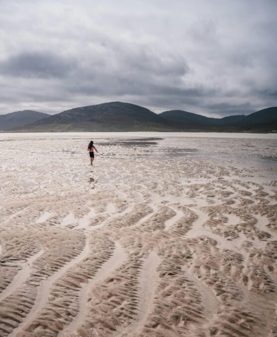 A lone figure on a vast Atlantic beach — Achill Wild retreat